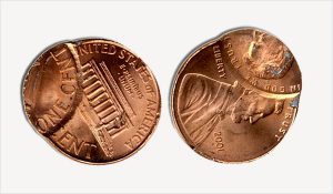 When the die is mistakenly pressed on the coin twice, the coin is called a double struck coin.