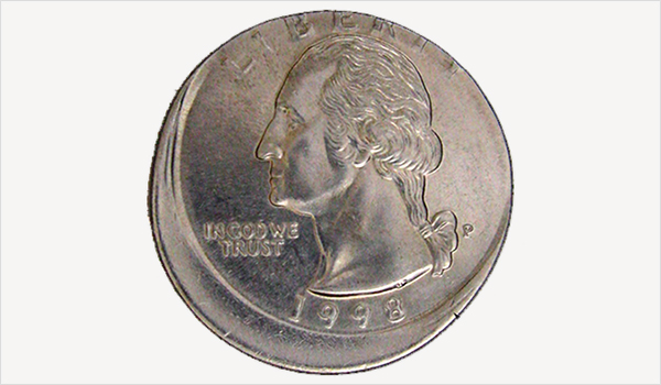 An example of an off center error coin